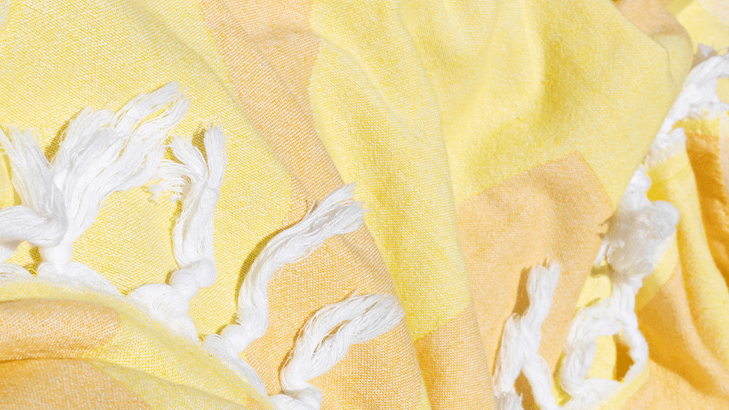 Yellow orange Turkish towel made with Turkish cotton by Pomp & Sass