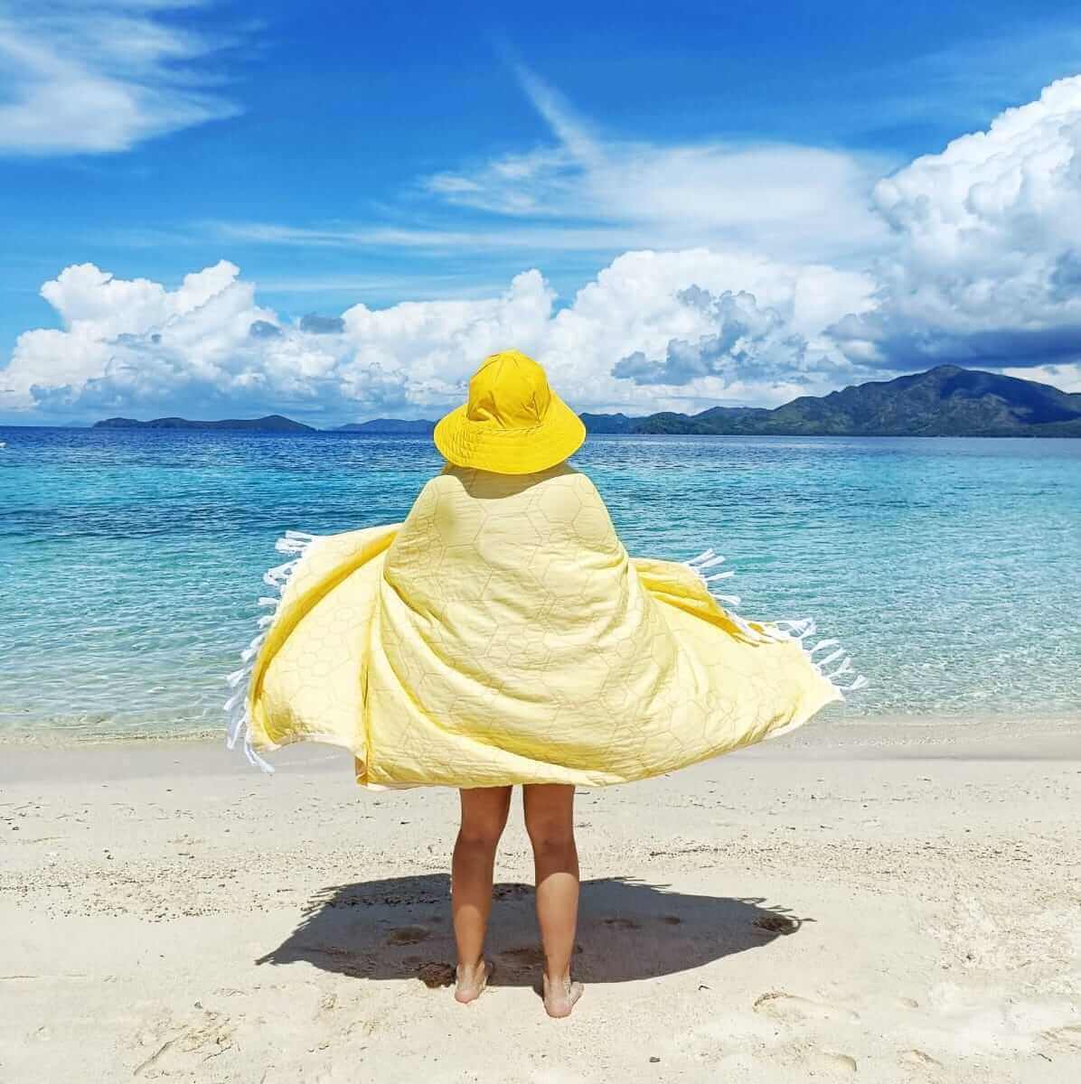 Turkish towels Canada in pure cotton for sustainability. Yellow and orange honeycomb design.