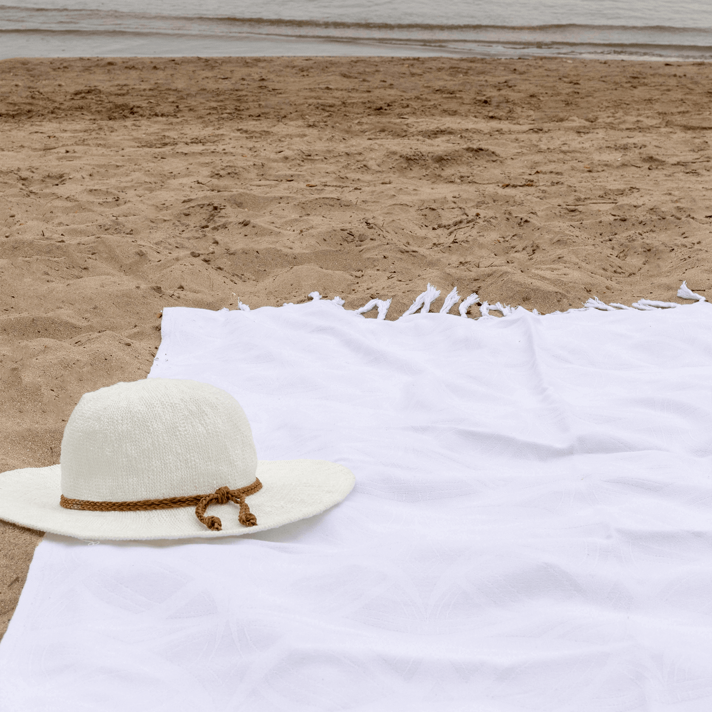 White Turkish towel at the beach