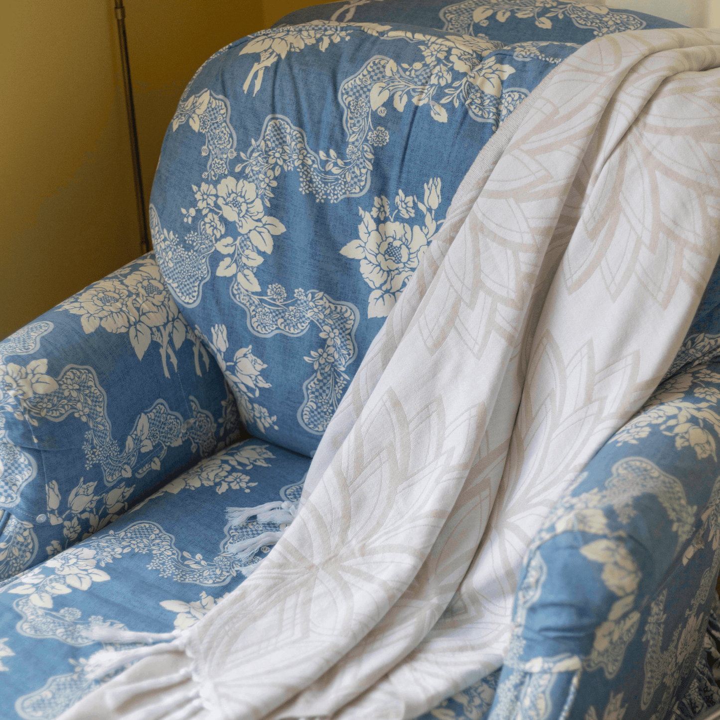 Turkish towel used as home decor over a chaise lounge