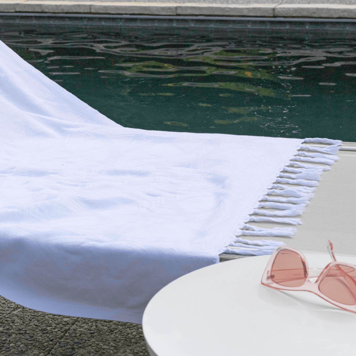 Turkish towels Canada in all white. Luxury Turkish cotton with a surface pattern designed in Canada. Sustainable and machine washable.