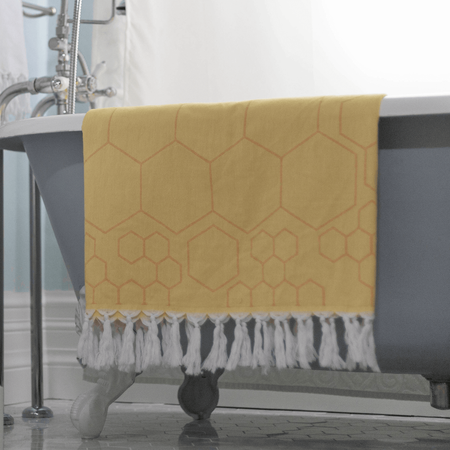 Yellow and orange Turkish towel in the bath