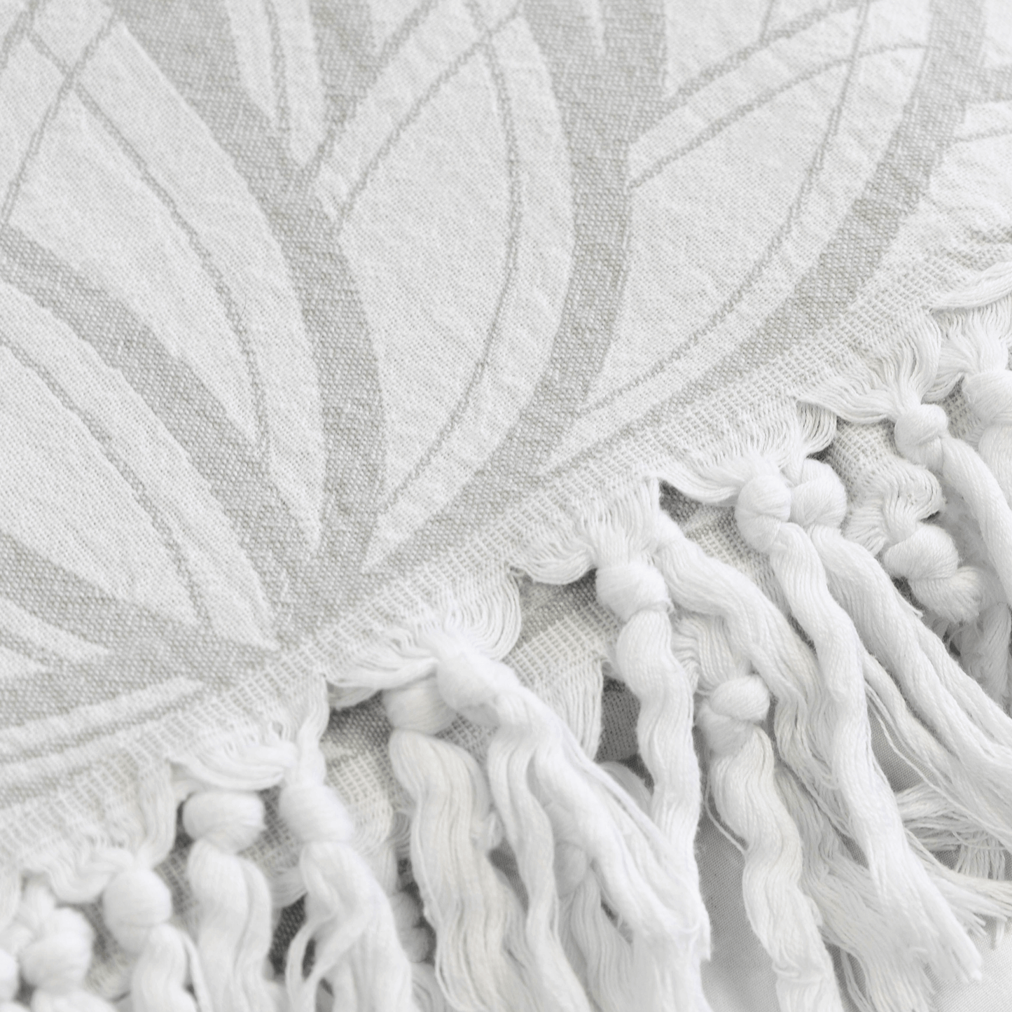 Turkish towels Canada in pure cotton for sustainability. Grey and white floral geometric design.