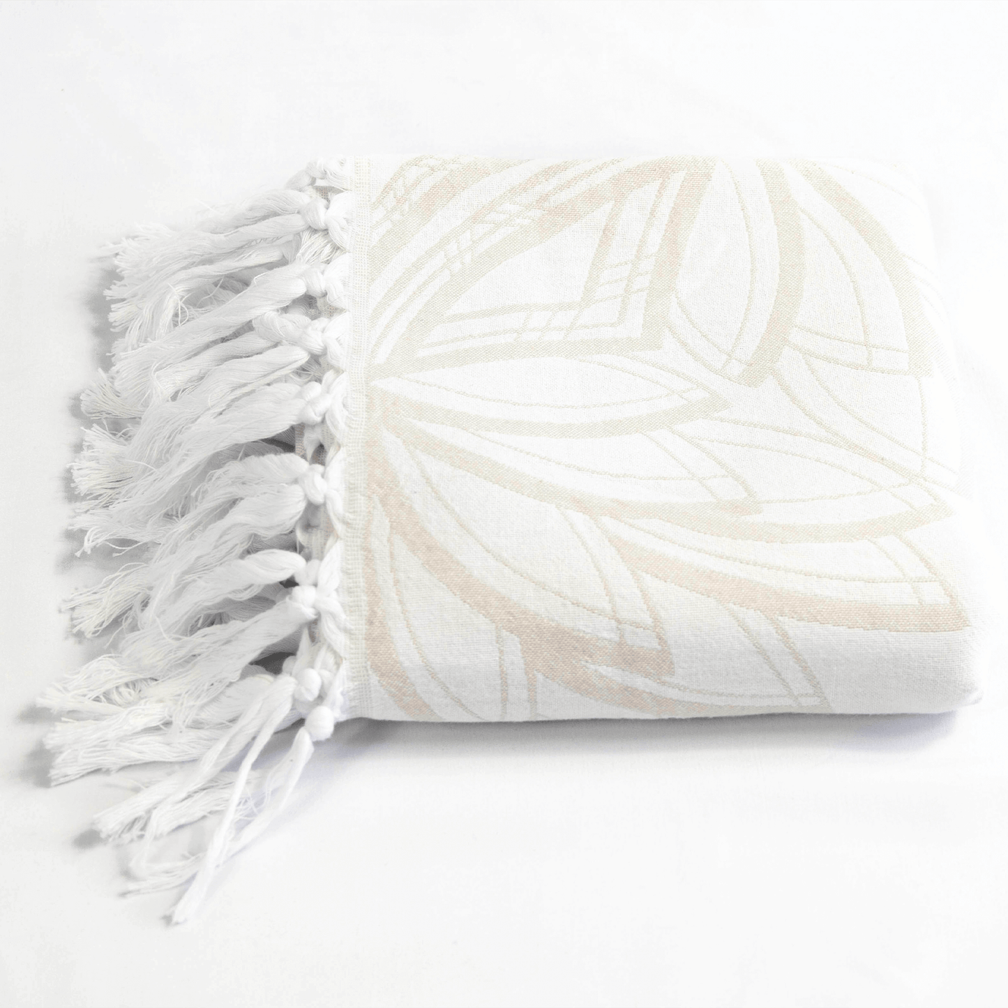 Turkish towels Canada in pure cotton for sustainability. Oat and white floral geometric design.