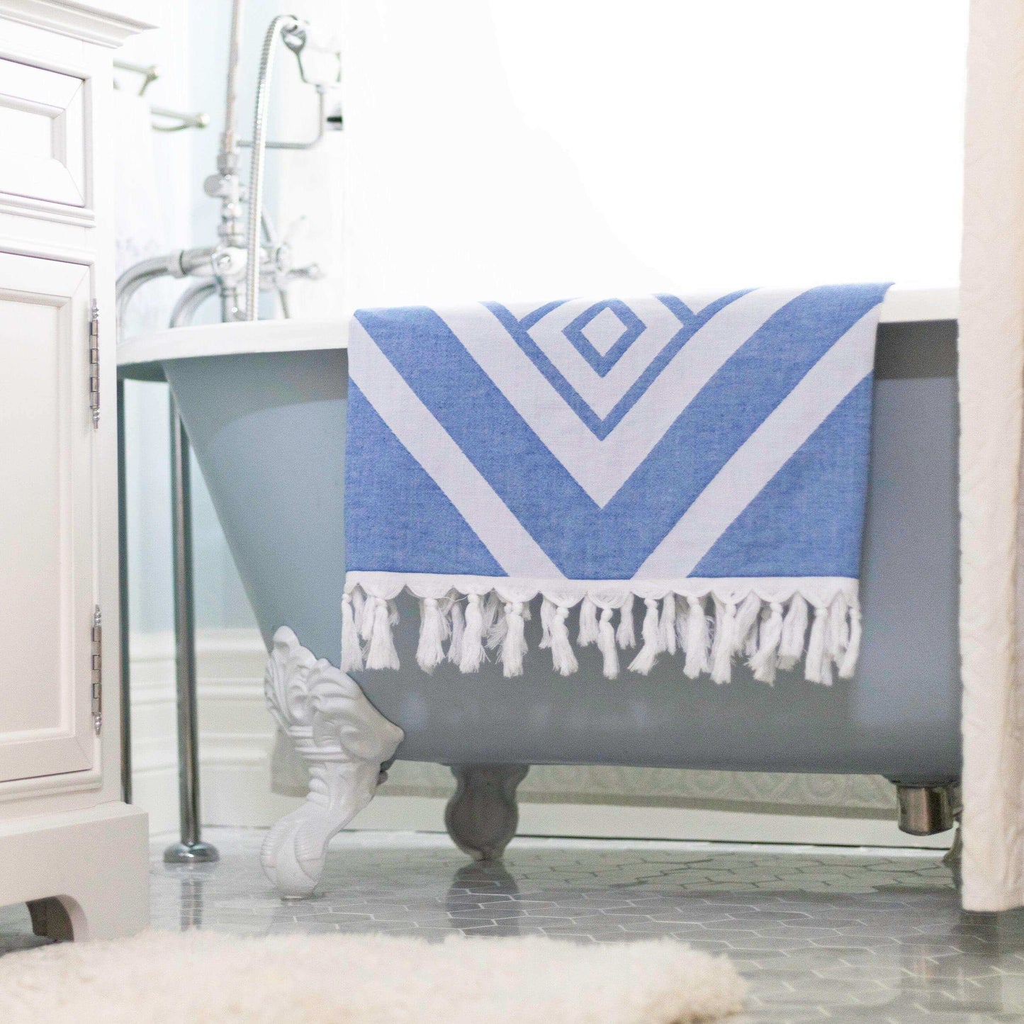 Turkish towels Canada in pure cotton for sustainability. Blue and white geometric design.