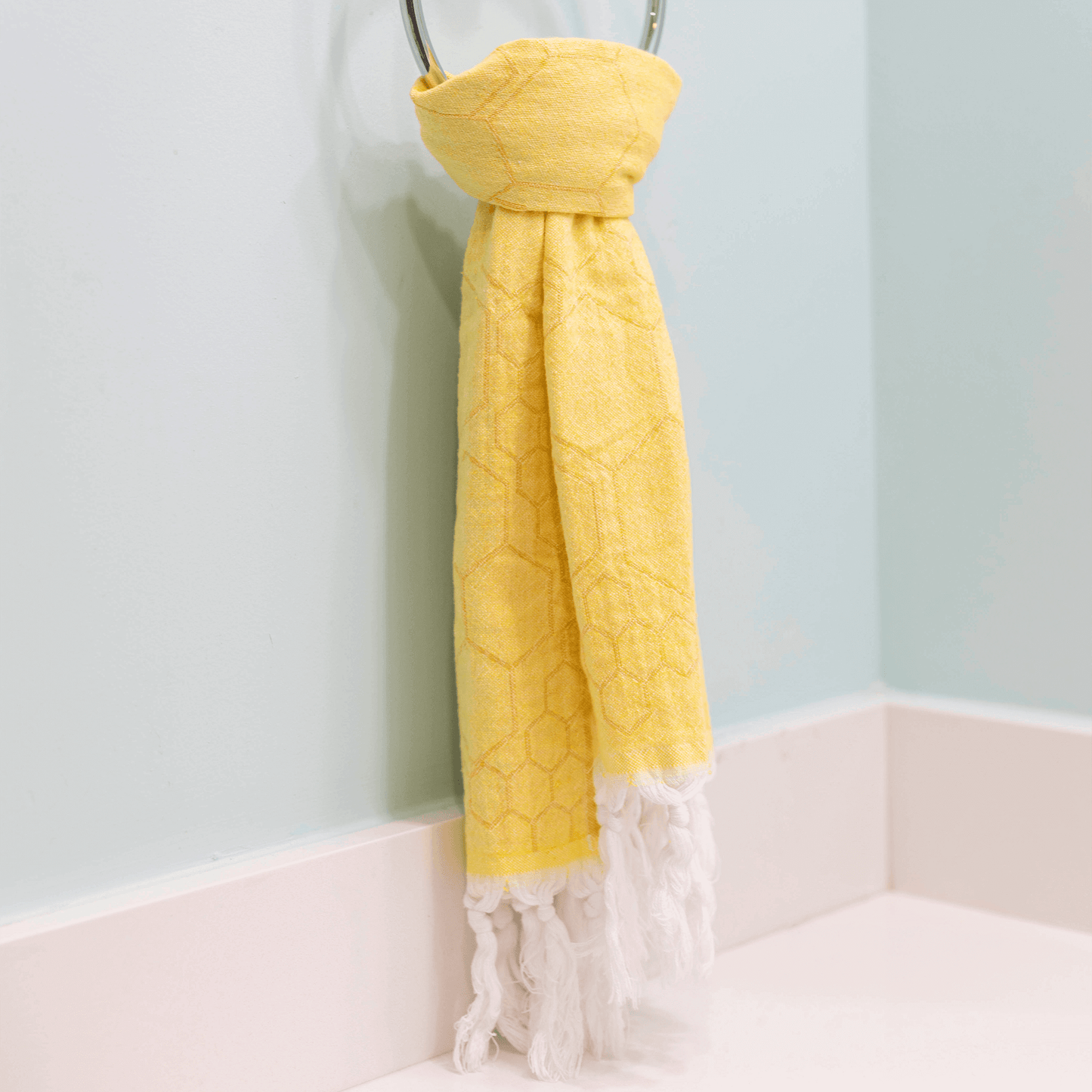 Yellow Turkish hand towel in the bath
