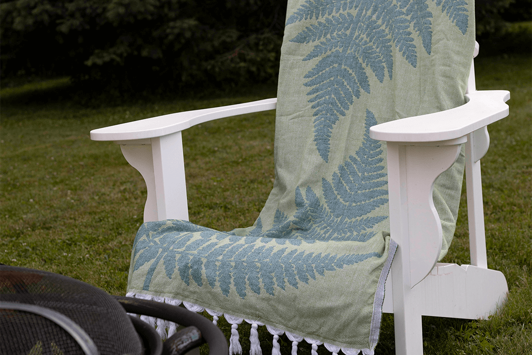 Pomp & Sass Turkish towel covering an adirondack chair