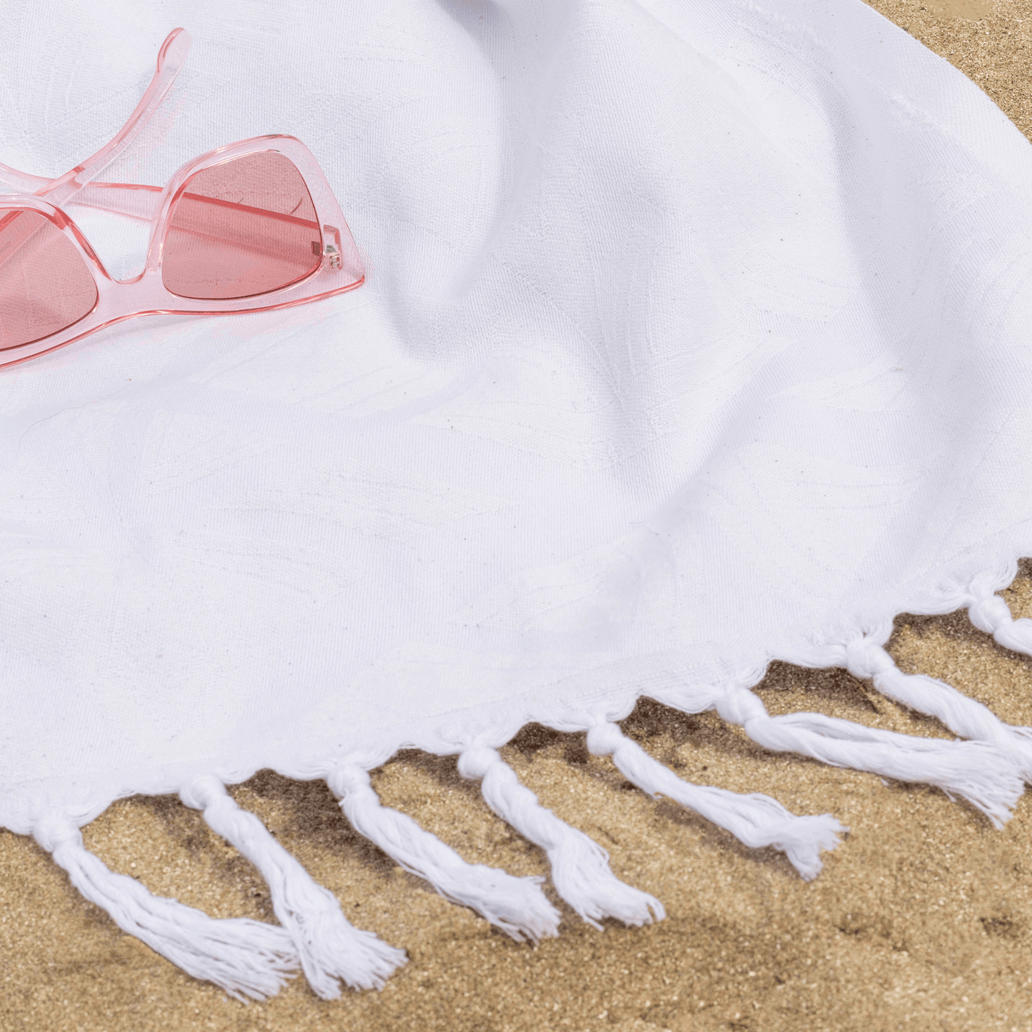 White Turkish towel at the beach