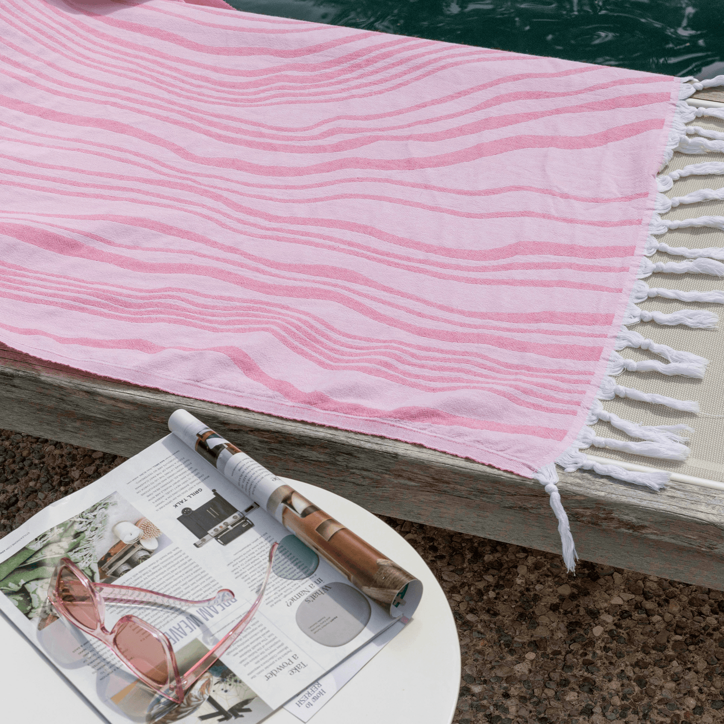 Pink Turkish towel poolside
