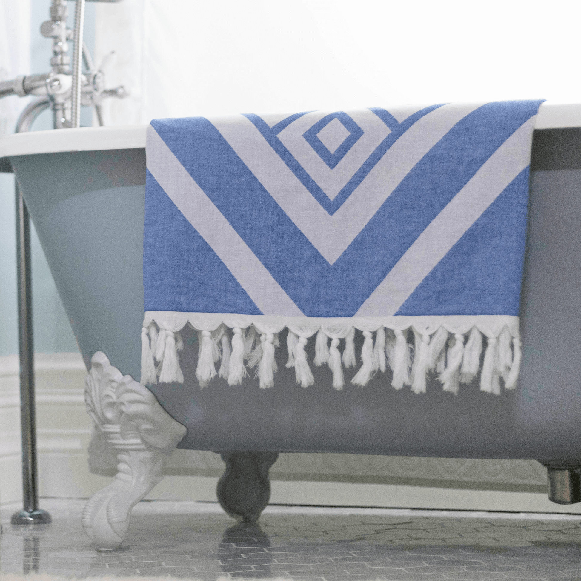 White and blue Turkish towel in the bath