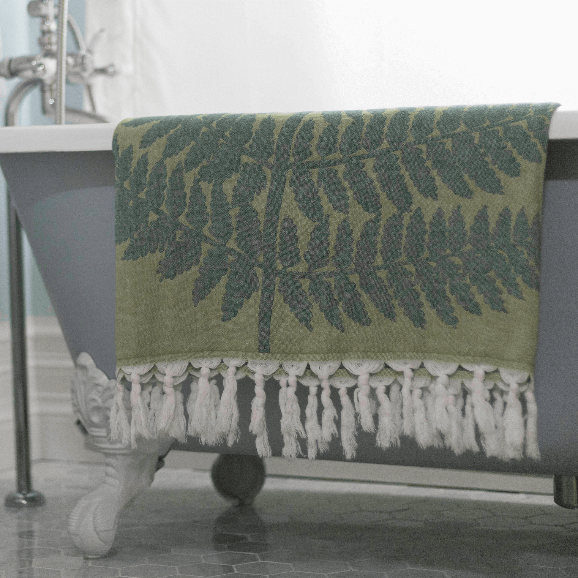 Green Turkish towel in the bath