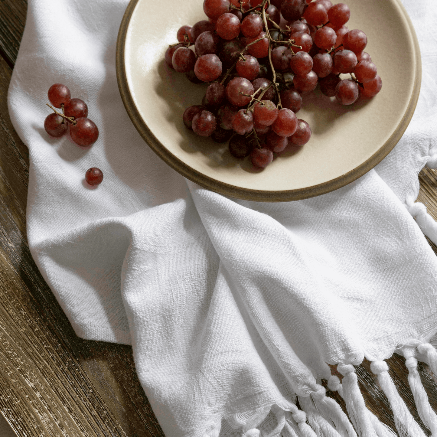 White Turkish towel as a hand towel with grapes