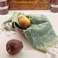 Green Turkish Hand Towel in the kitchen with pears 