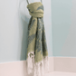 Green Turkish towel as hand towel in bath
