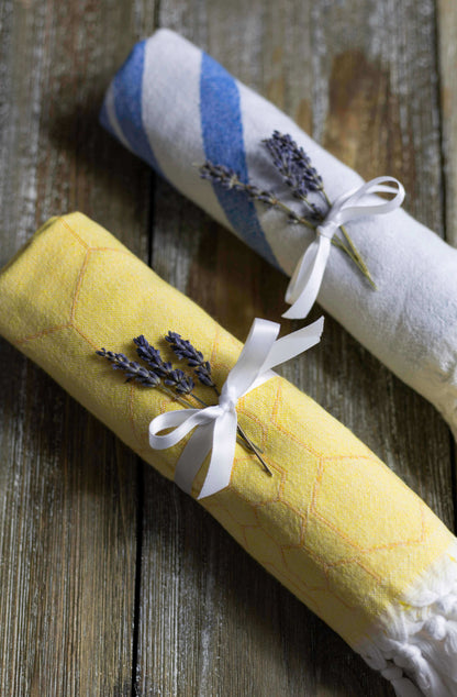  Yellow Turkish hand towel rolled as a gift
