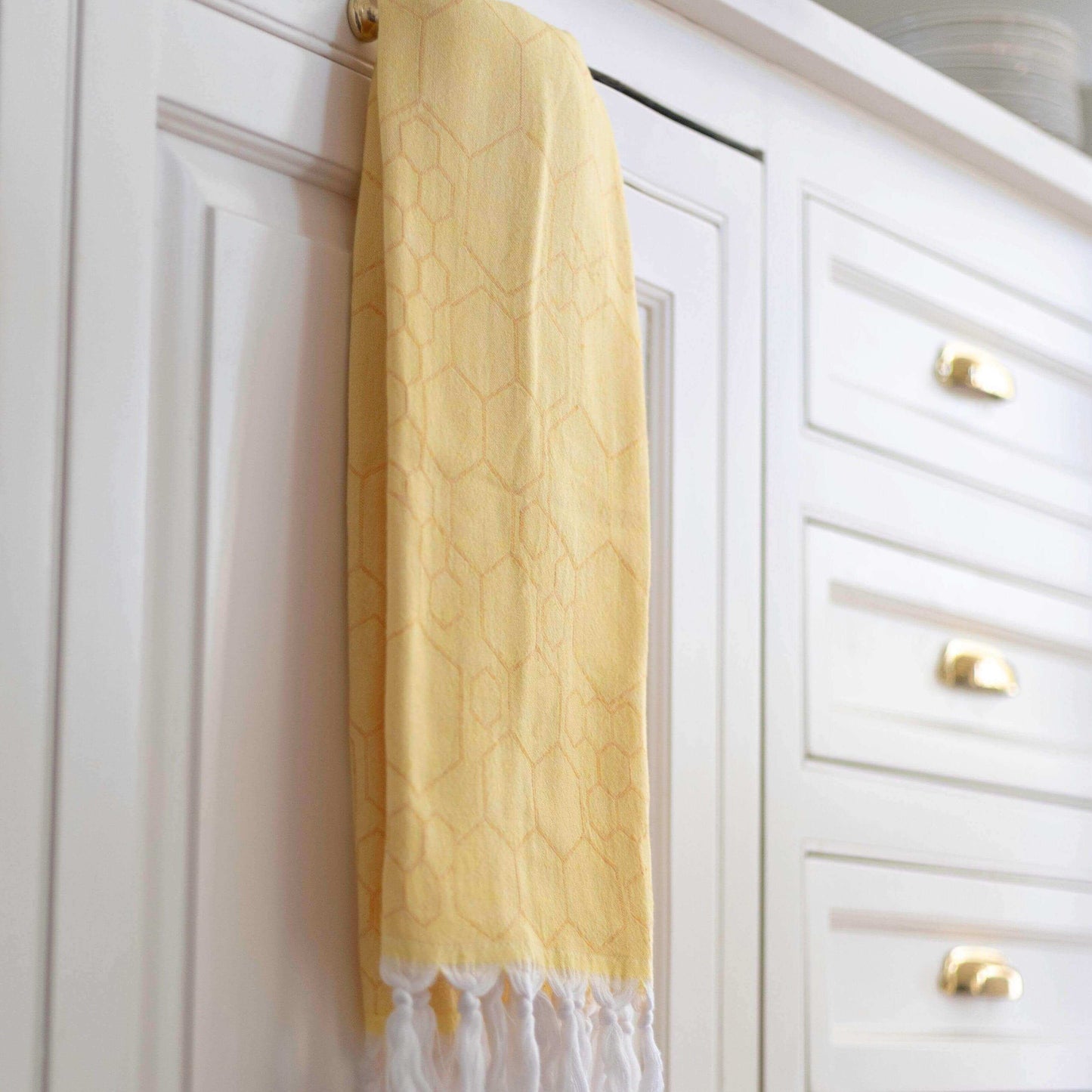Yellow Turkish Hand Towel hanging in the kitchen as a tea towel
