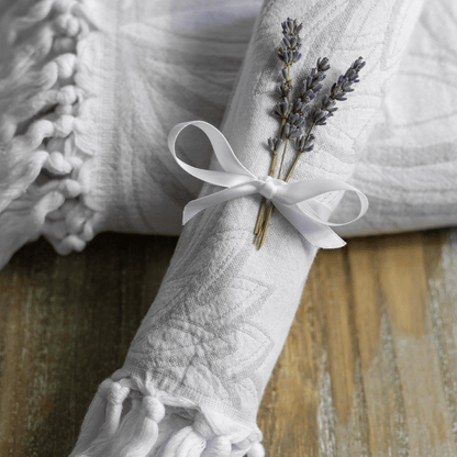 Grey and white Turkish hand towel wrapped as a gift