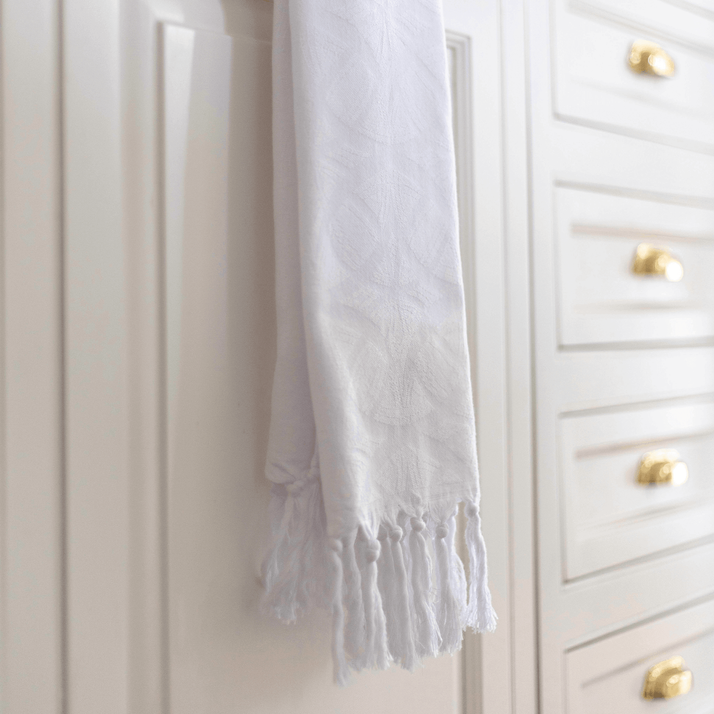 White Turkish towel in the kitchen as a tea towel