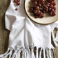  White Turkish towel with grapes on a plate