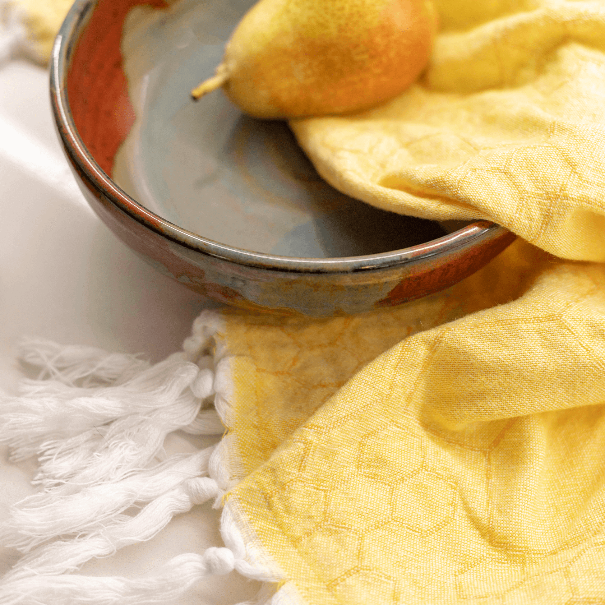 Yellow and orange Turkish towel in the kitchen