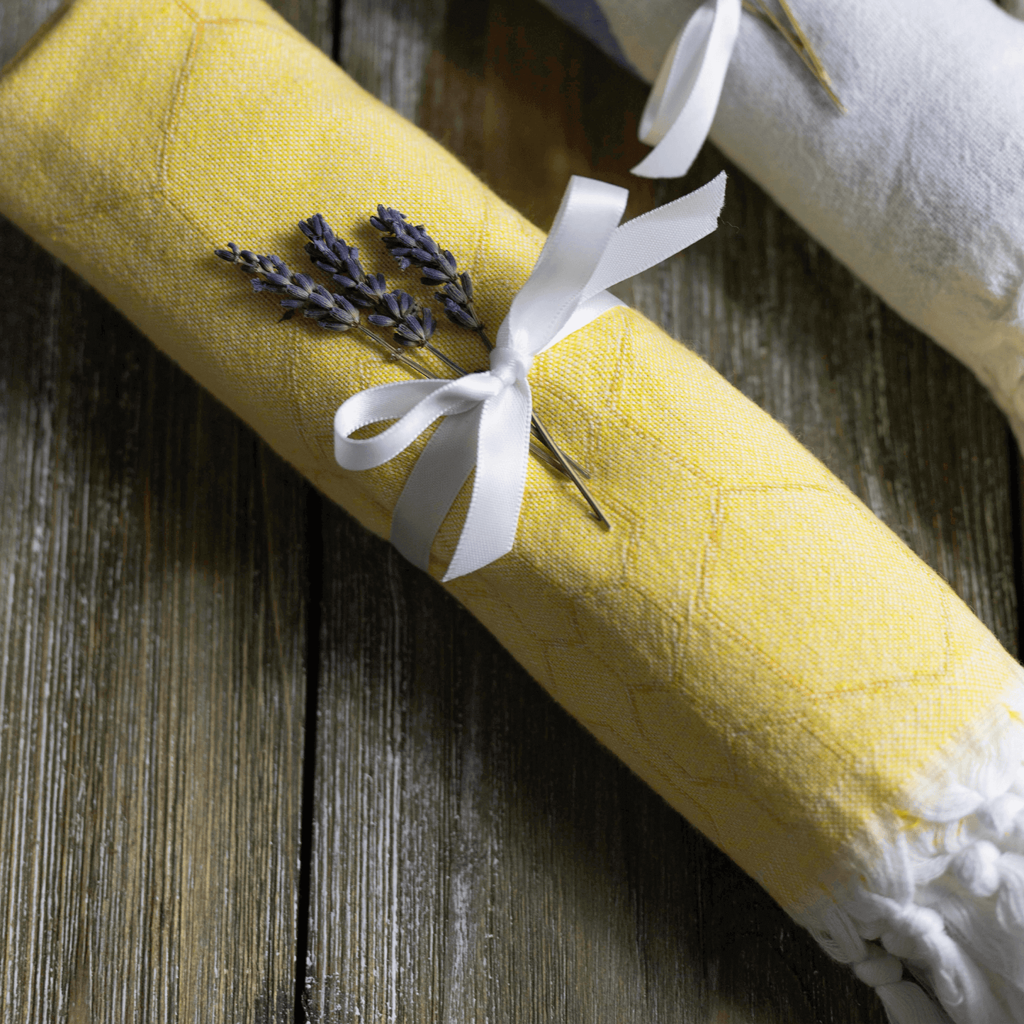 Yellow and orange Turkish towel wrapped as a gift